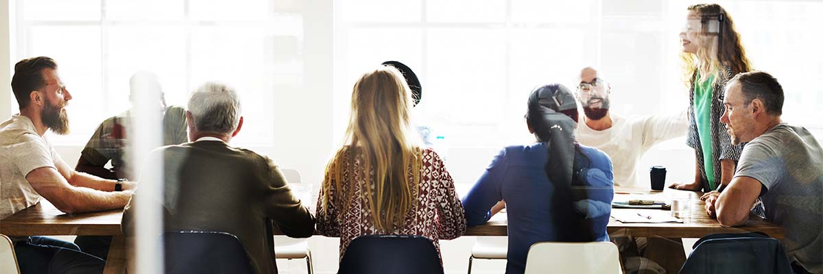 students at the conference table