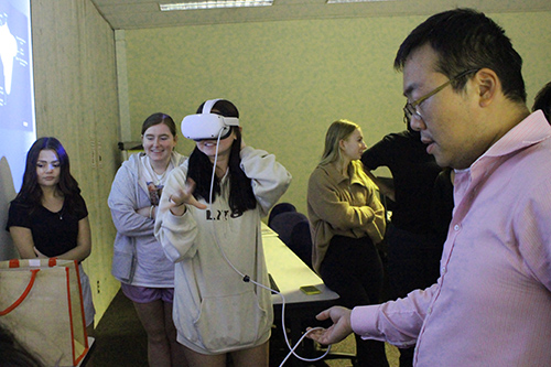 Students and teacher in the classroom using virtual reality