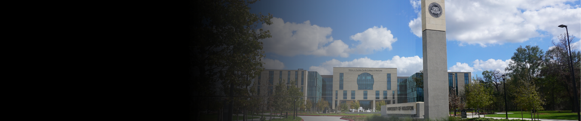 College of Medicine Building with University Monolith Sign in foreground