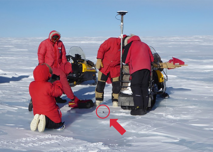 ANSMET team recovering a meteorite.